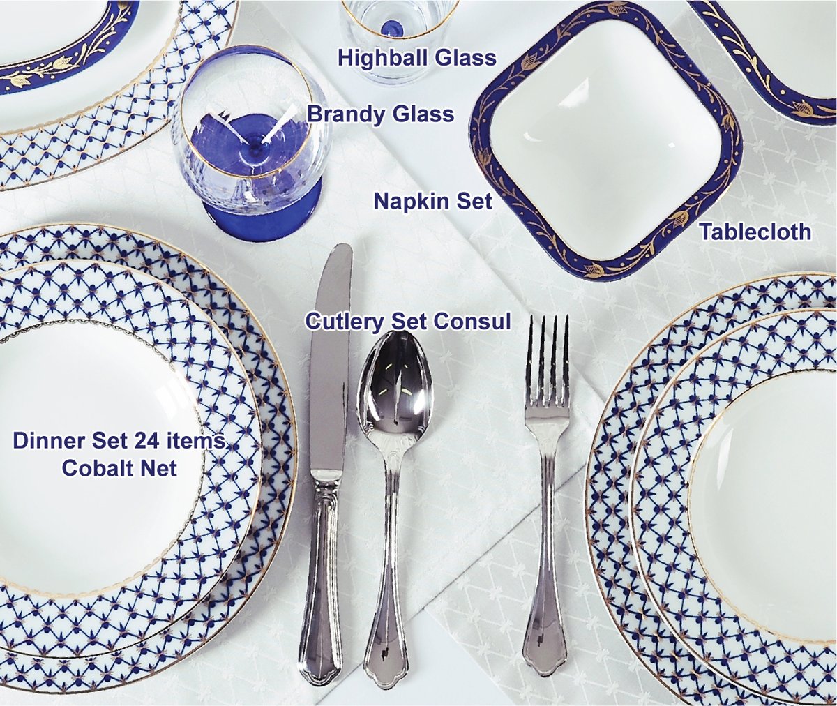 Table setting with a Cobalt Net dinner set, glasses and cutlery