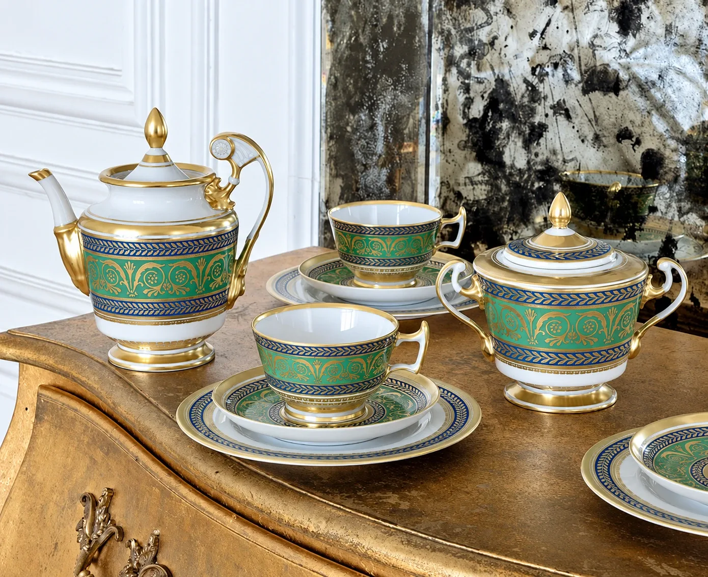Imperial porcelain tea service on an antique cabinet